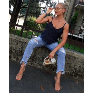 Jeans boy-friend chiaro con strappi |